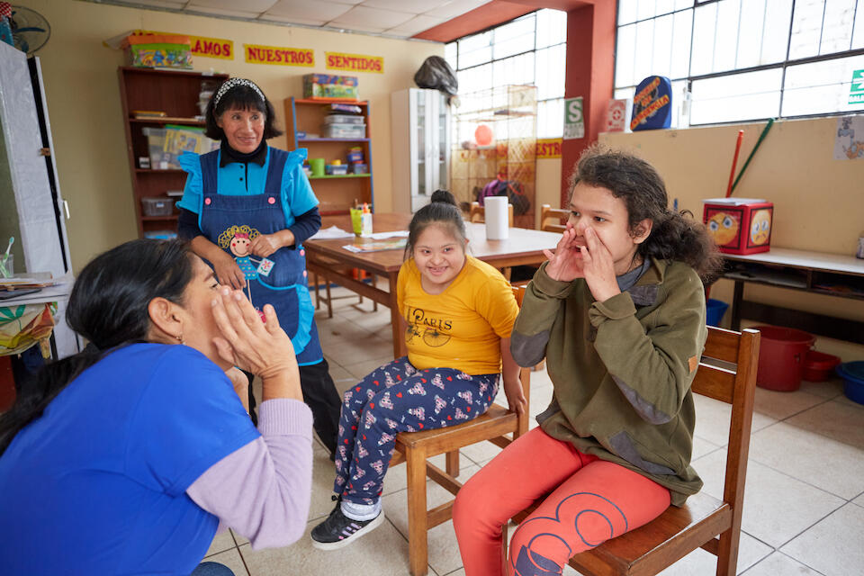 Anaís, far right, receives special services for children with disabilities at a UNICEF-supported school in Peru.