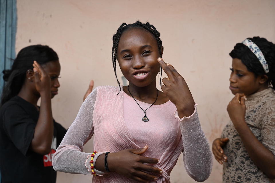 Maurine, 16, of eastern Cameroon, is learning sign language through a UNICEF-funded initiative.