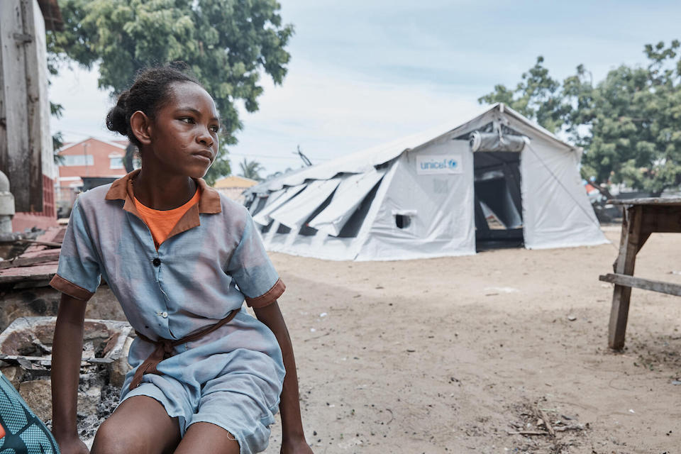 Nady, 13, sits next to a temporary classroom provided by UNICEF for students from public secondary school Antaninarenina, Tulear 1, Atsimo Andrefana region, Madagascar.