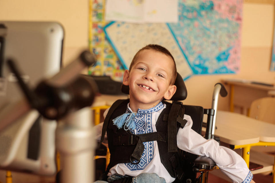 Bohdan, 7, of western Ukraine, attends school despite his disability with support from UNICEF.