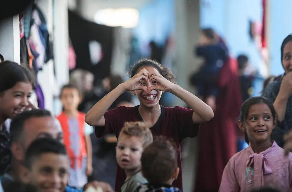 Displaced by bombardment in Gaza, 11-year-old Amal is living at a shelter in Khan Younis City.