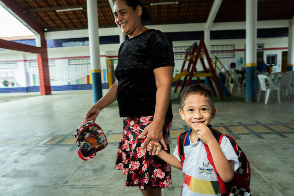 On March 30, 2023, Ivone de Lima collects her son Samuel, 4, from the UNICEF-supported Rocilda Germano Arruda Early Childhood Education Center in the Beira Rio neighbourhood of Baturité, Ceará state, Brazil.