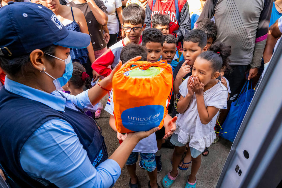 On Sept. 18, 2023 in Esquipulas, Guatemala, children receiving humanitarian kits containing personal hygiene supplies provided by UNICEF and its partners.