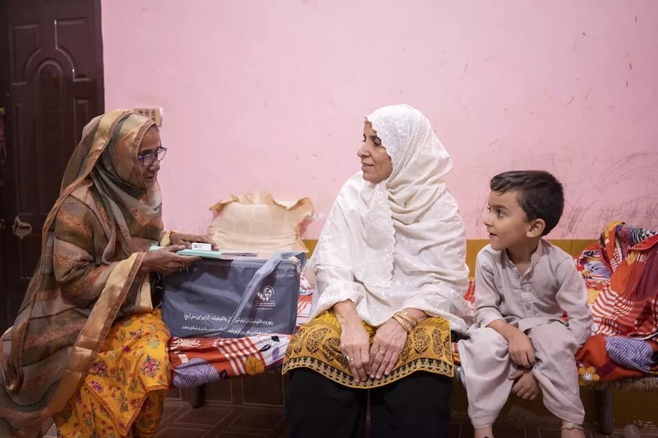 A "Lady Health Worker," visits families at home to provide health care services in Hyderabad, Sindh, Pakistan.