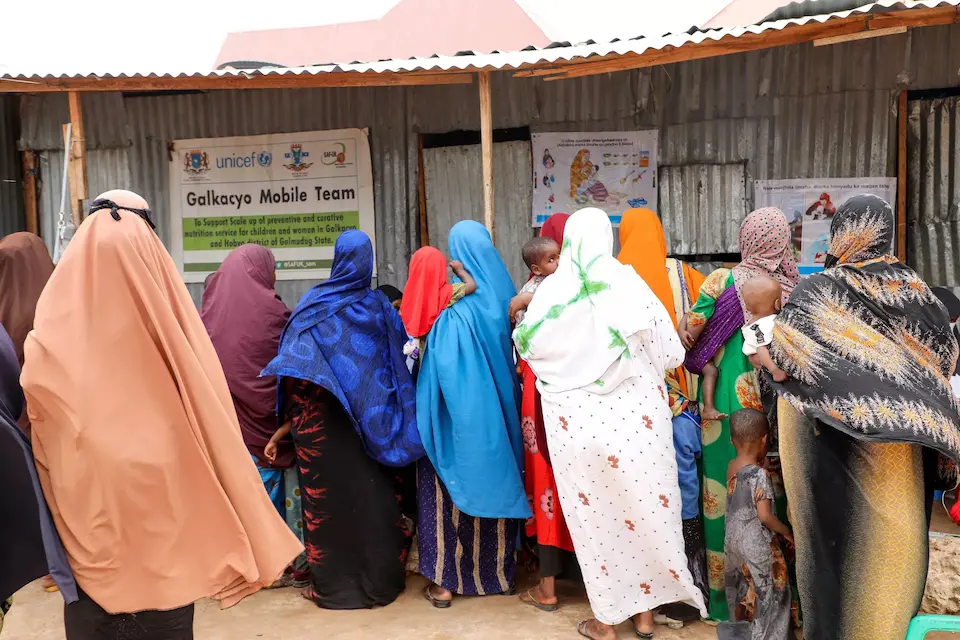 The UNICEF-supported Mudug Mobile Health Clinic in South Galkayo, Somalia, welcomes mothers living at the Deegaan IDP camp who are bringing their children to be screened for malnutrition.