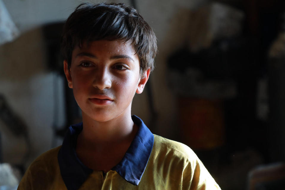 Bahaa, 13, of Lebanon left school to go to work to help support his family.