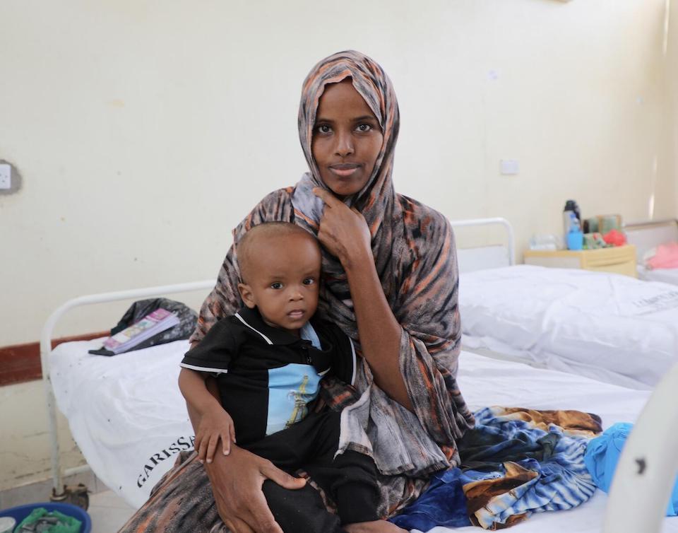 Ten-month-old Mansuur is held by his mother, Harira Adow, at the UNICEF-supported stabilization center of Garissa County Referral Hospital in Kenya, where he is recovering from severe acute malnutrition.