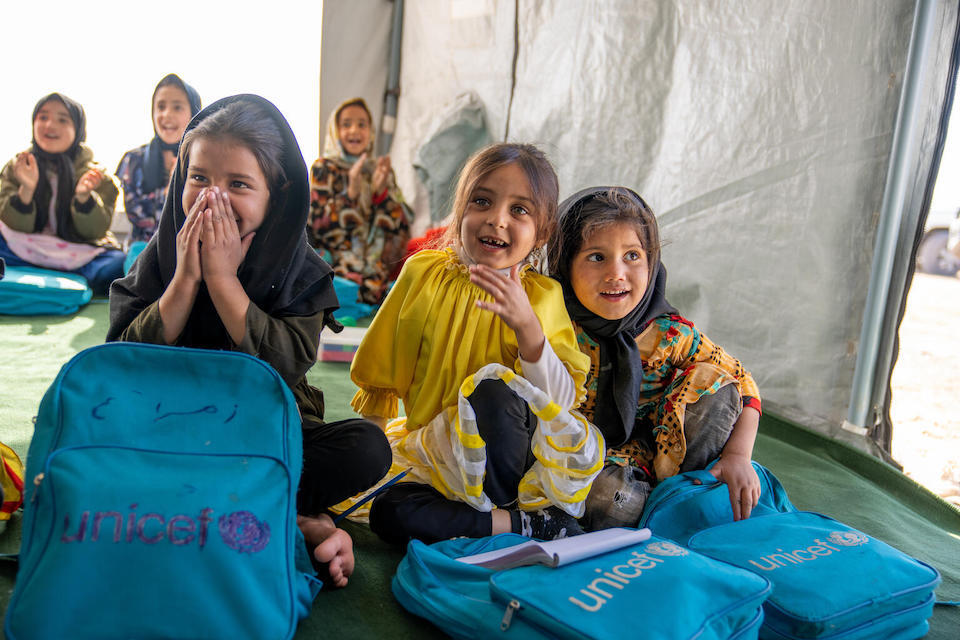 Children affected by October 2023 earthquakes have a place to play and learn at a UNICEF tempororary learning space in Zinda Jan district, Herat province, Afghanistan.  