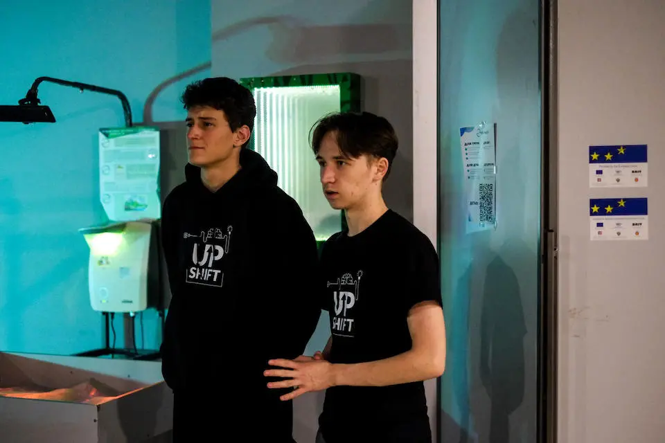 On Dec. 14, 2023 in Ivano-Frankivsk, Ukraine, young members of a UNICEF UPSHIFT team share information on sustainable electricity production.