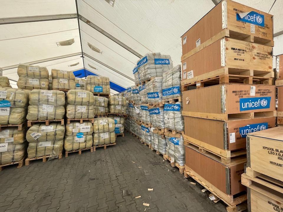 UNICEF supplies stacked on pallets in a warehouse in Rafah, southern Gaza Strip, await delivery on Jan. 17, 2024.
