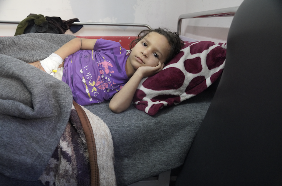 Luway, 5, rests in a bed in Nasser Hospital in Khan Younis, Gaza Strip, on Jan. 16, 2024.