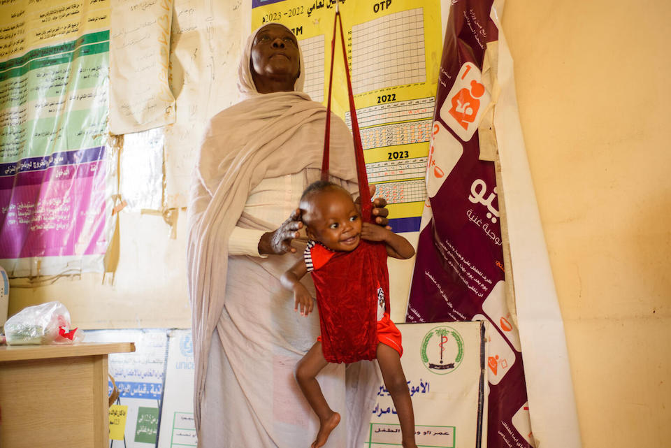 One-year-old Mawada undergoes nutrition screening during a review at UNICEF-supported Dar Al-Salam health facility in Port Sudan