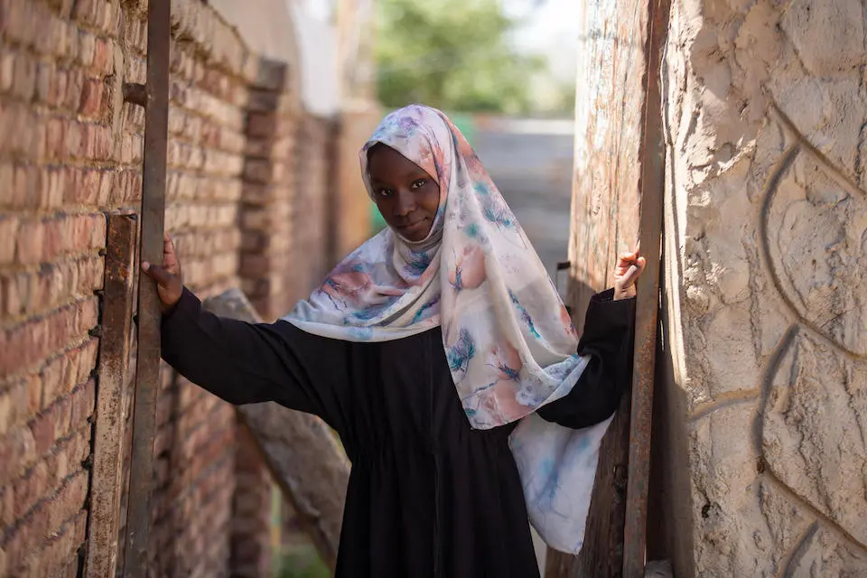 Thirteen-year-old Fiyha, UNICEF-supported child rights activist and president of her school's Saleema (girls) club at her home in remote Al- Gabaleen, White Nile State, Sudan.