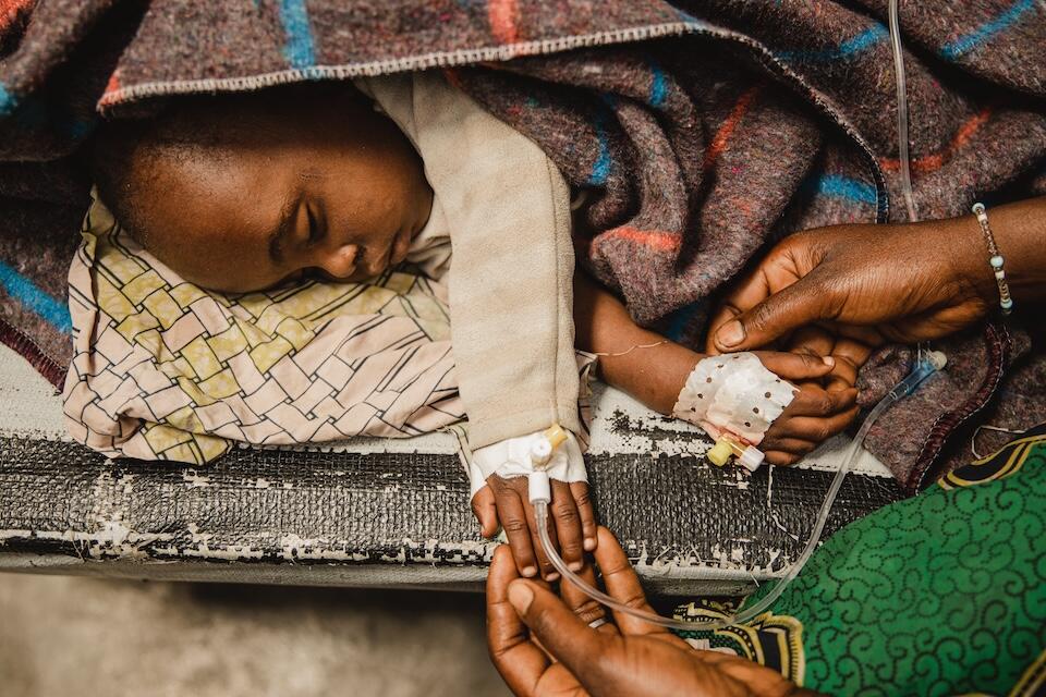 A child is treated for cholera at the UNICEF-supported Afya Sake Cholera Treatment Center in North Kivu province, Democratic Republic of the Congo.