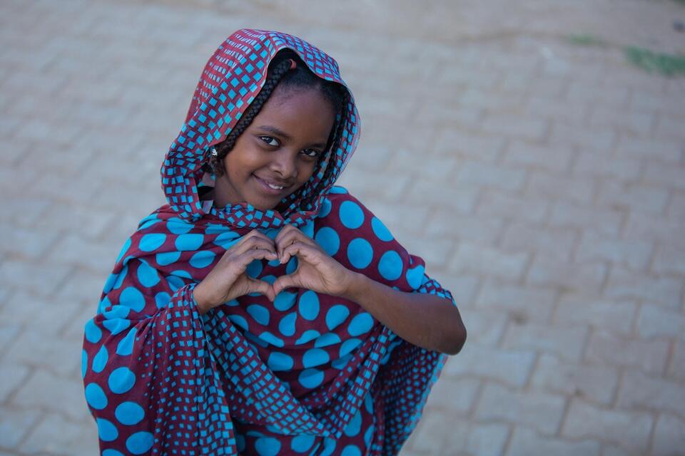 Mai, 9, and her family were displaced by Sudan's brutal civil war.