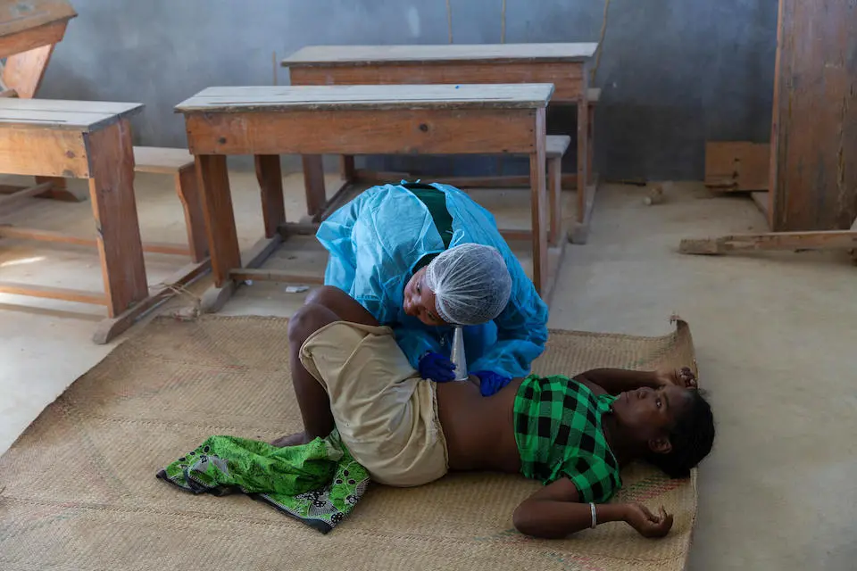 A pregnant mother is examined by a health worker at a UNICEF-supported mobile clinic in the village of Belaza, southwestern Madagascar.