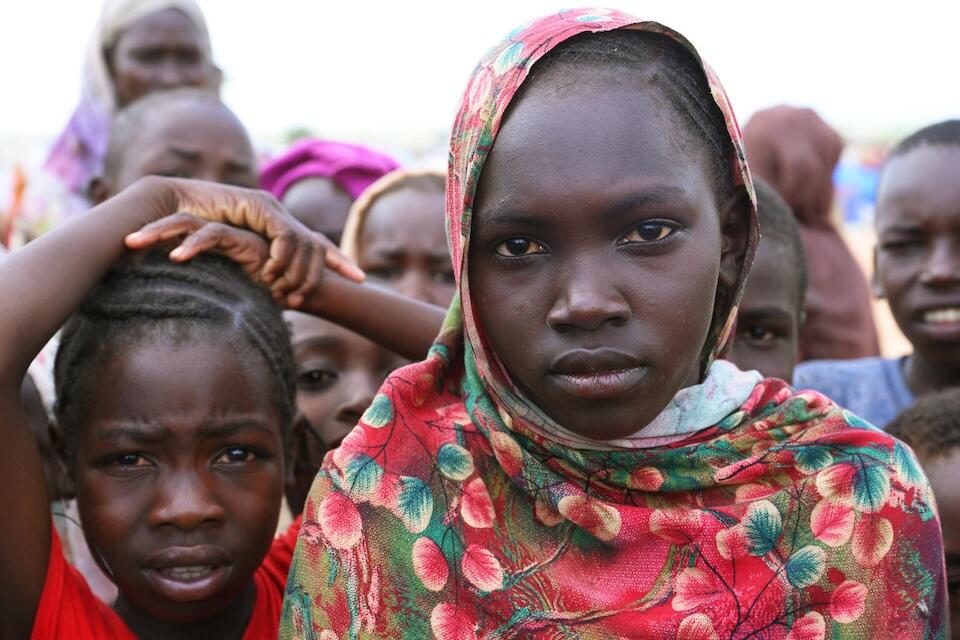 Sixteen-year-old Mouzan, right, at the refugee site of Adré in eastern Chad, close to the border of Sudan.