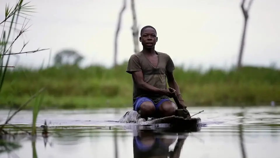 Delphin of Kampyempye village, Tanganyika province, eastern DRC, going fishing before school.