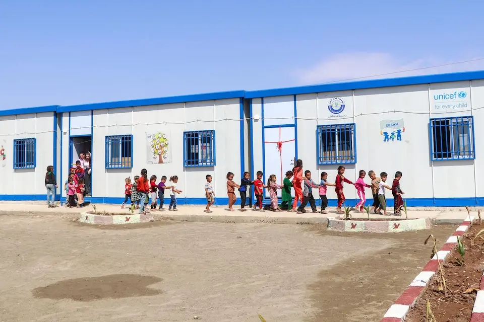 Young children outside a UNICEF -supported center for early childhood education called ‘Dream’ in Ain Khadra IDP camp in Al-Malikiyeh, Al-Hasakeh, Syria, on Sept. 21, 2023.