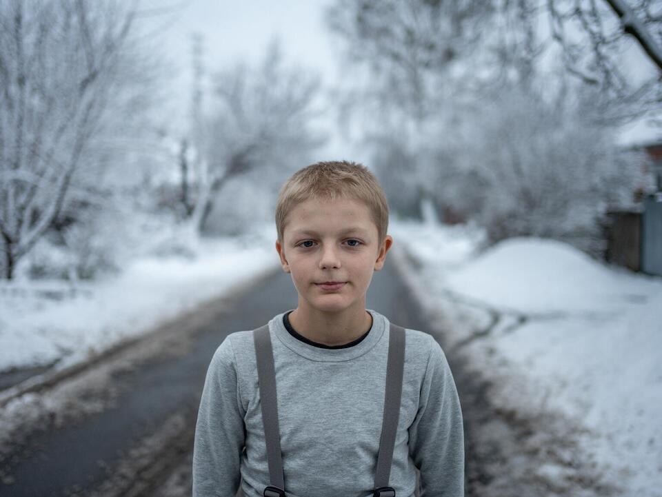 Eleven-year-old Bohdan lives in Izyum, in Ukraine’s Kharkivska region, a city that has endured near-total destruction over two years of conflict. 