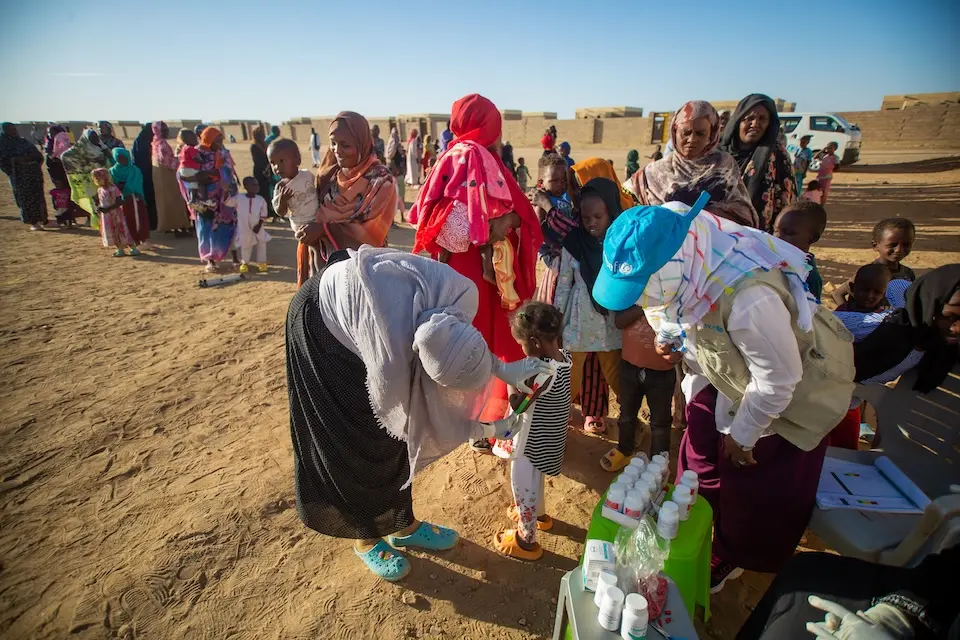 Displaced children are screened for malnutrition at Alnahda gathering point, River Nile state, Sudan.