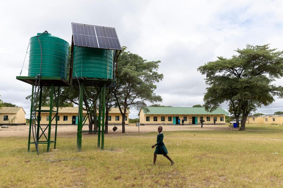 Water storage containers and solar panels installed by UNICEF and partners at the Mapengani primary school in Matebeleland South Province, Zimbabwe.