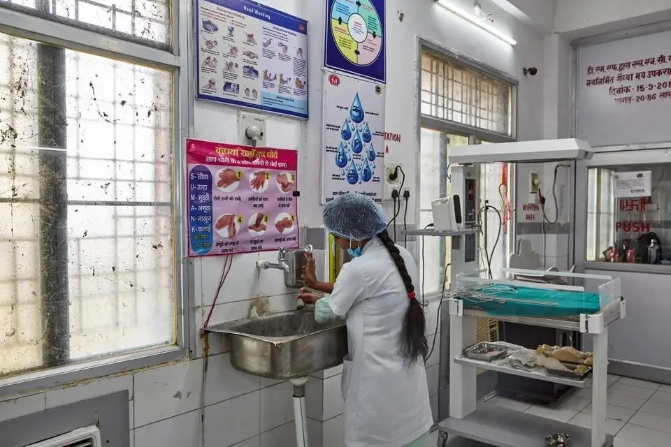 Following the steps for safe handwashing helps health care systems reduce the risk of infection and disease. A hospital worker at the District Combined Hospital in Lodhi, Sonebhadra, Uttar Pradesh follows the protocol.