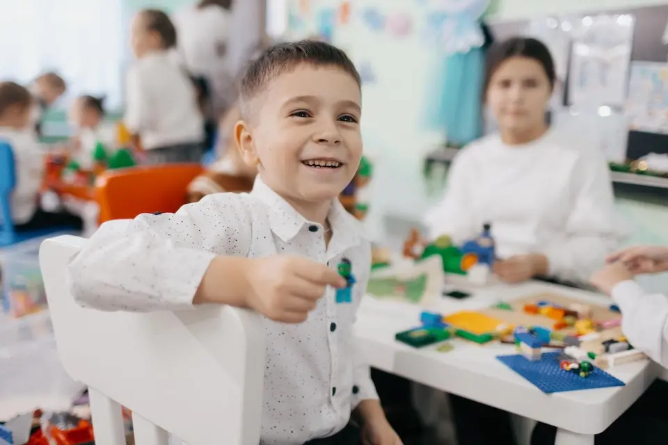 Misha, 6, plays with LEGO blocks at a UNICEF play and learning hub in Balti, Moldova.