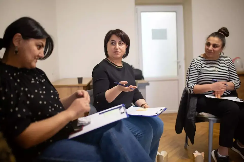 In Yerevan, Armenia, refugee parents meet for a group discussion supported by UNICEF and partners.