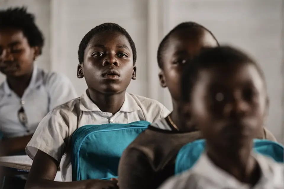 Nikuze, 12, is enrolled in Year 6 in one of six temporary learning spaces set up by UNICEF at the Walugaba Primary School, located near the Rusayo site for displaced people in North Kivu province, Democratic Republic of Congo.