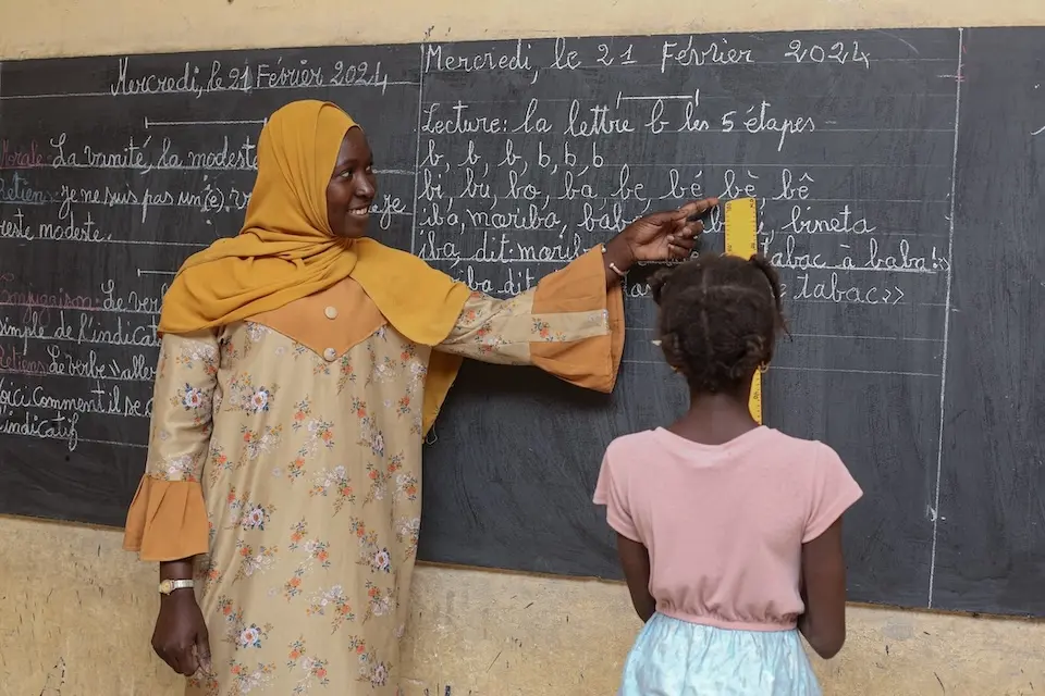 Salamata, 9, is invited to the chalkboard to demonstrate her work at Mahamane Fondogoumo School in Timbuktu, Mali.