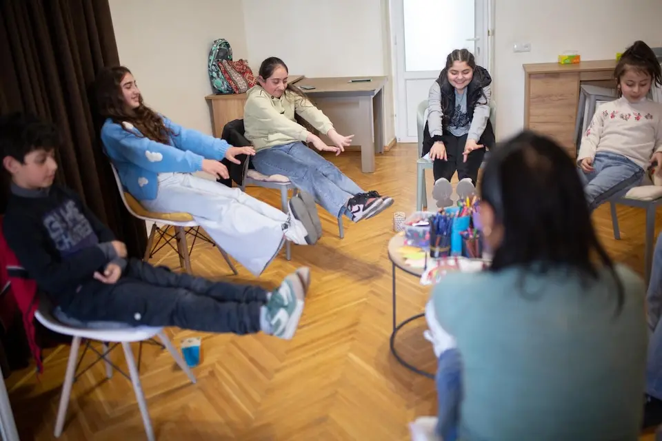 Displaced adolescents participate in a group activity organized by UNICEF and partners in Yerevan, Armenia.