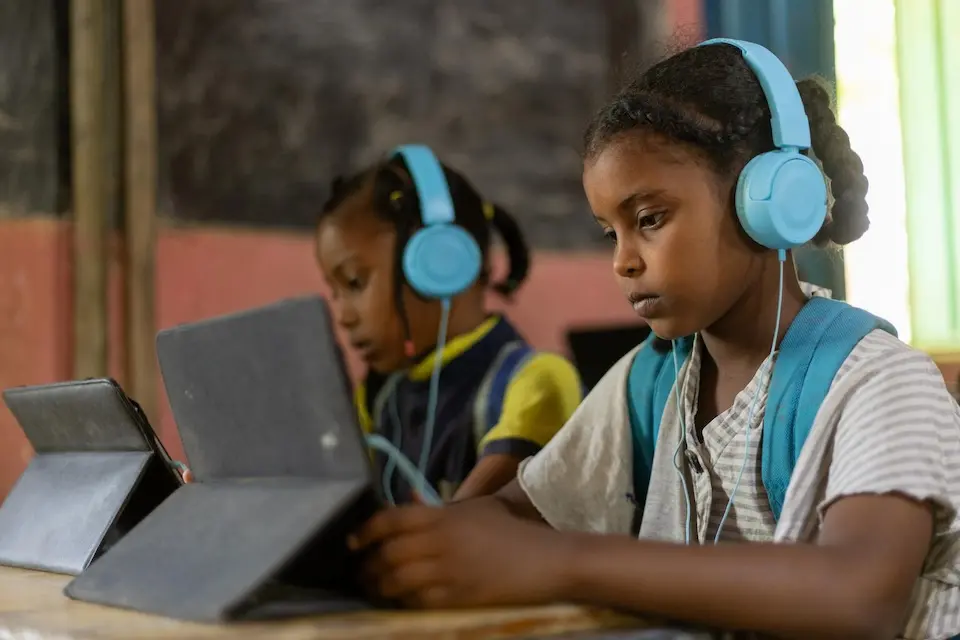 Digital learning helps children continue their education at a UNICEF safe learning space in Kassala state, Sudan.