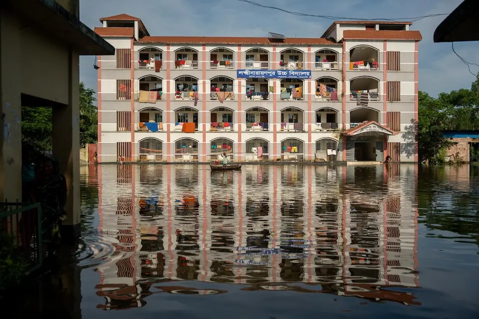 Families forced to evacuate their flooded homes found shelter in this school building in Ramgati, Chittagong Division, Bangladesh.