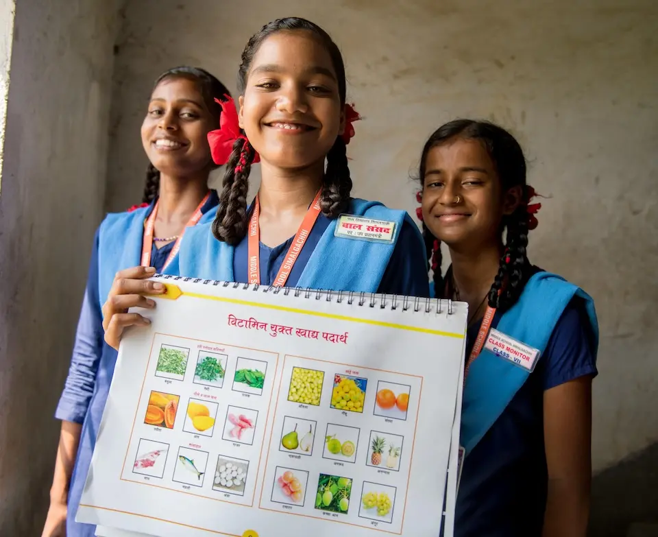 Girls from Simal Gachi Middle School share an example of nutrition and lifestyle education.