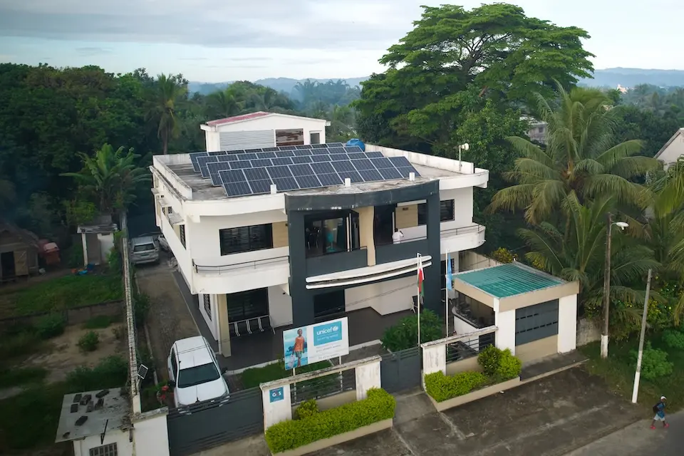 A bird's eye view of a UNICEF field office in Fenerive Est, Madagascar, which is equipped with solar panels.
