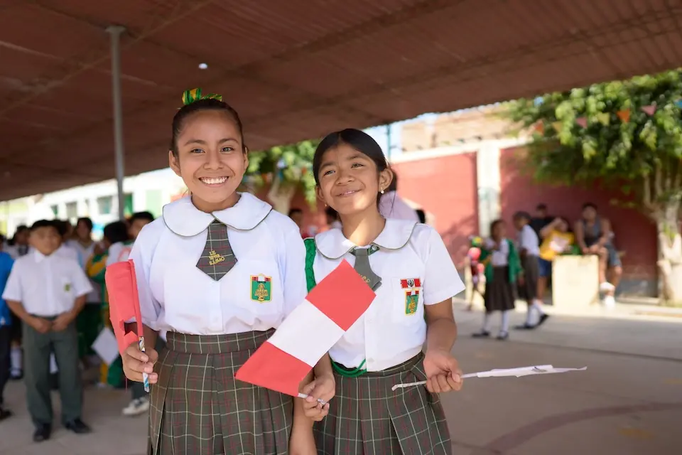 Students who attend a school that UNICEF helped repair after it damaged by a cyclone and where a UNICEF-supported program is helping children understand and help prepare for future climate-driven extreme weather events.
