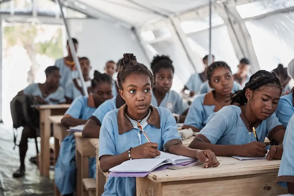 After Hurricane Freddy in 2023, secondary students returned to school in a tent supplied by UNICEF after two weeks without classes. 