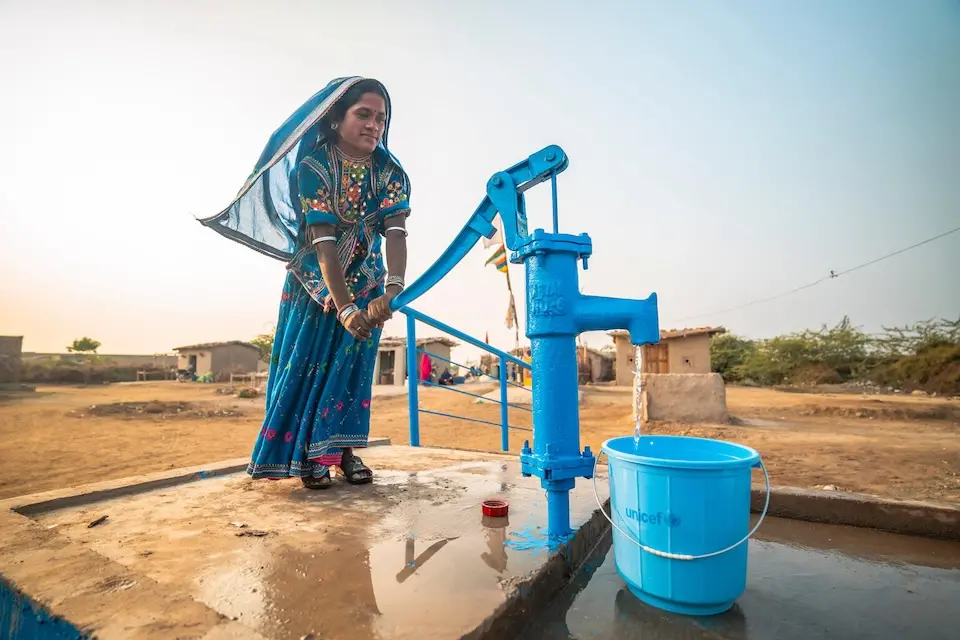 Lali, 18, is happy with the water pump installed by UNICEF in the village of Mir Jan Muhammad, Mirpurkhas, Sindh, Pakistan. 
