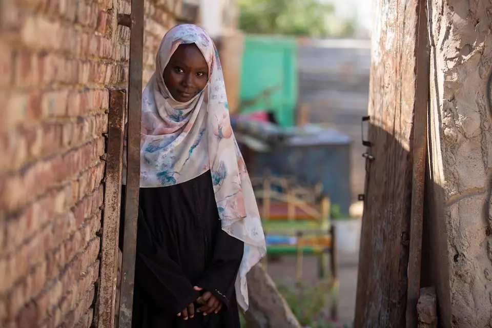Fiyha, 13, is a child rights activist and president of the girls' or Saleema club at her home located in the remote locality of Al-Gabaleen, White Nile State, Sudan.