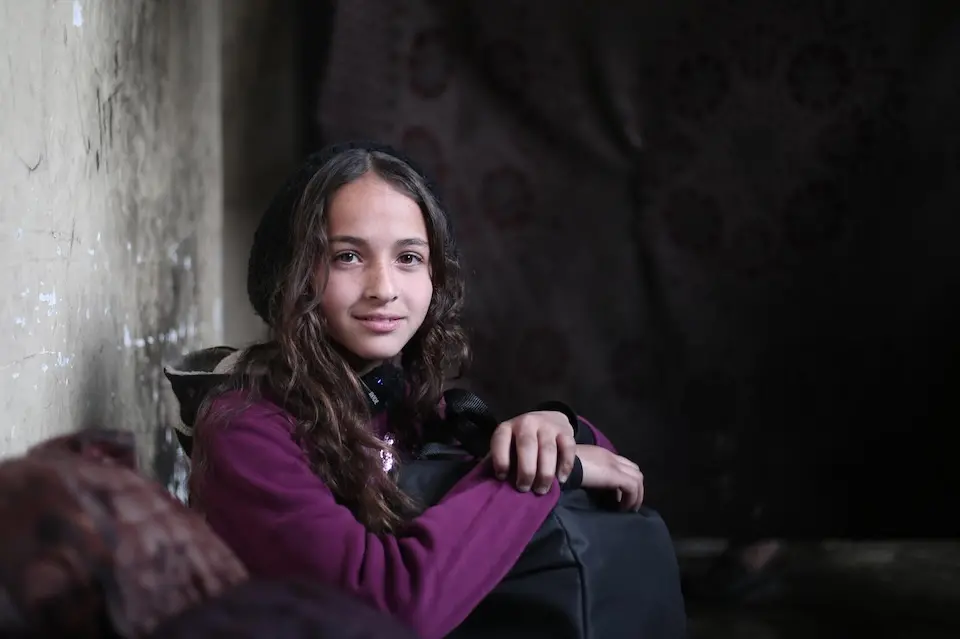 Alma, 12,  received UNICEF’s adolescent girl’s wel-lbeing kit in Rafah city, southern Gaza. 