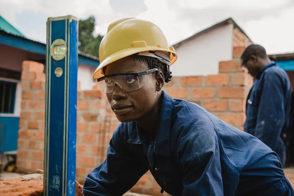 Pombo, 16, at a UNICEF-supported masonry training course at the Institut Nationale de Préparation Professionnelle in Nynuzu, Tanganyika province, DR Congo.