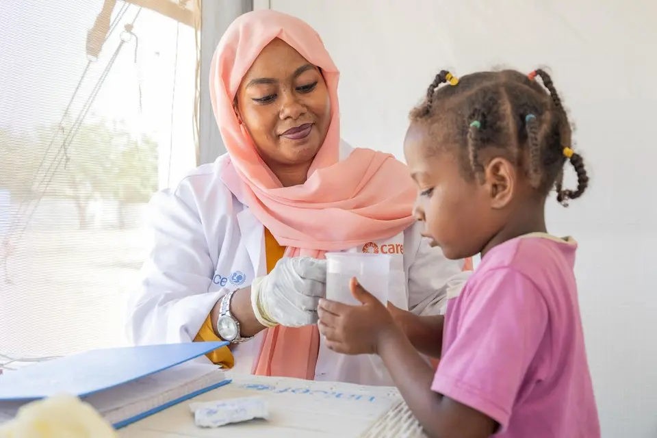 On Oct. 16, 2024, 4-year-old Watin drinks oral rehydration solution at the oral rehydration point (ORP) in the UNICEF-supported Alkarama medical clinic in Kassala state.