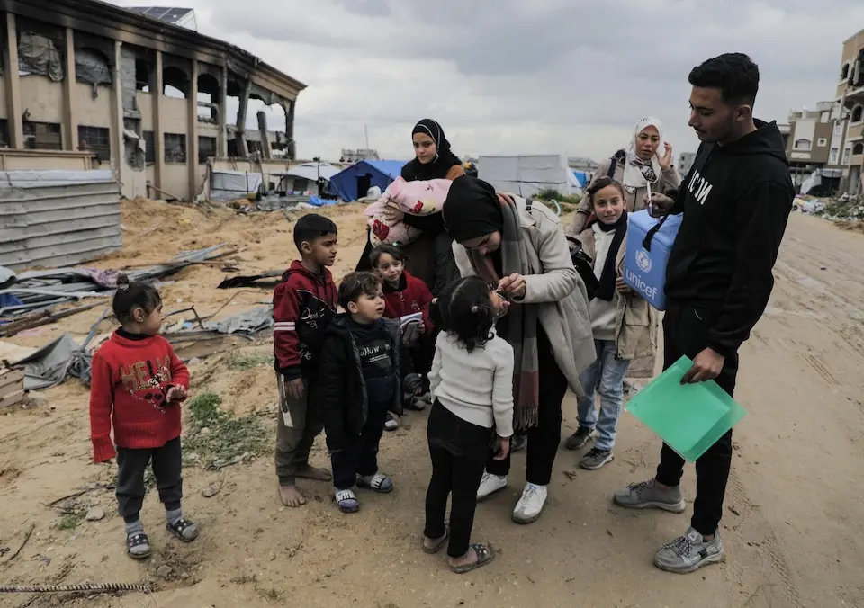 Children receive polio vaccines in Jabalia, in the northern Gaza Strip, as part of a mass vaccination campaign in February 2025.