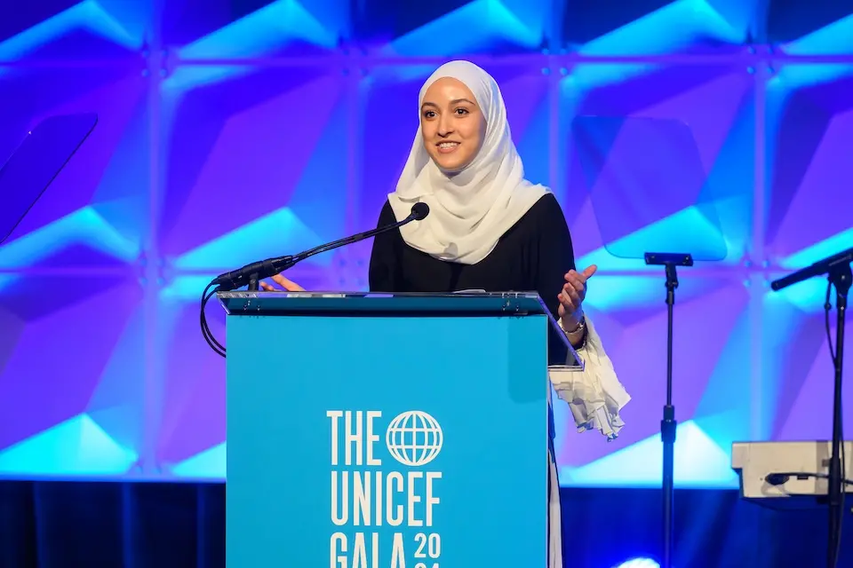 UNICEF USA National Youth Council member Sophia Sophia speaking at the UNICEF Gala in New York City in December 2024.
