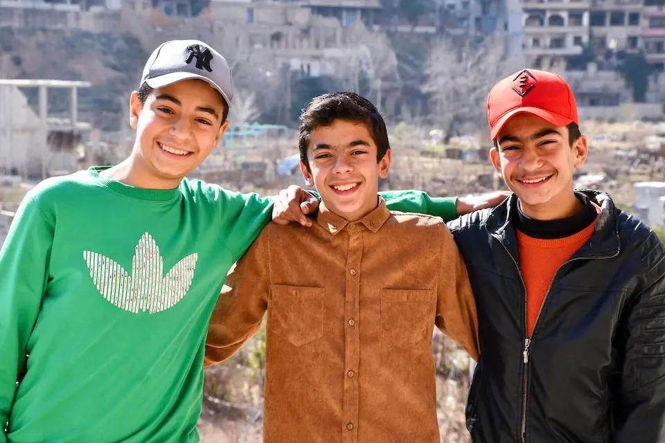 Three friends in Bseimeh village, Rural Damascus, Syria on Feb. 2, 2025.