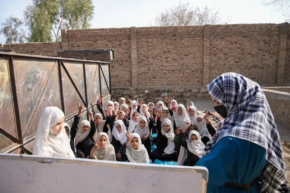 Before their new school was built by UNICEF, teachers held class outdoors at at Soroubi Girls’ School in Nazyan district, Nangarhar, Afghanistan.