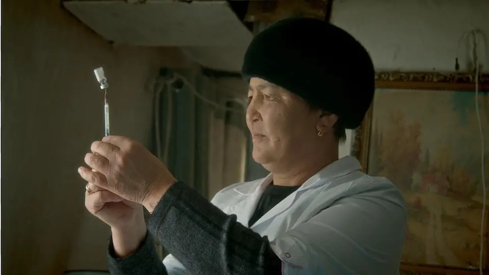 UNICEF-supported medical nurse Jiydegul Rysbaeva prepares a vaccine for a child in Kyrgyzstan's Jon-Bulak Valley.