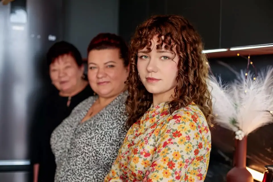 Nadya, 15, with her mother Olena and grandmother Tetiana in Ukraine.