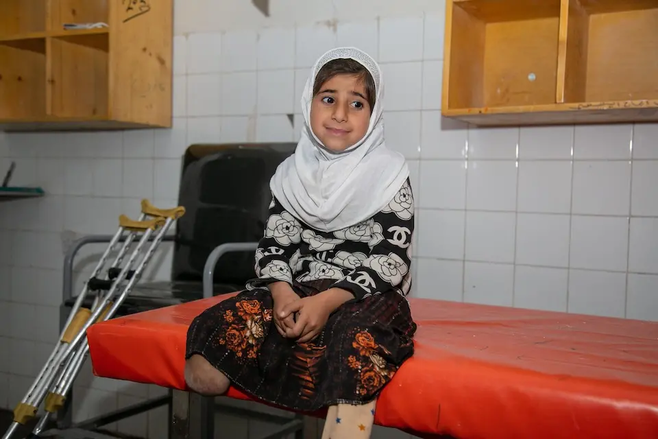 After years of battling an infection, 9-year-old Khadija's leg was amputated below the knee.